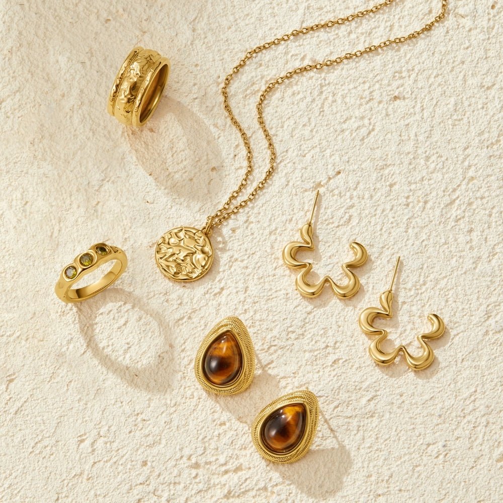 Pendientes de lágrima de ojo de tigre dorado